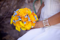 Maui wedding bouquet, round with orange roses, yellow calla lilies and Tiffany blue hydrangeas